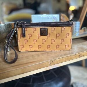 Dooney&Bourke leather Pittsburgh Pirates Brow Embossed Wristlet likenew, scratch